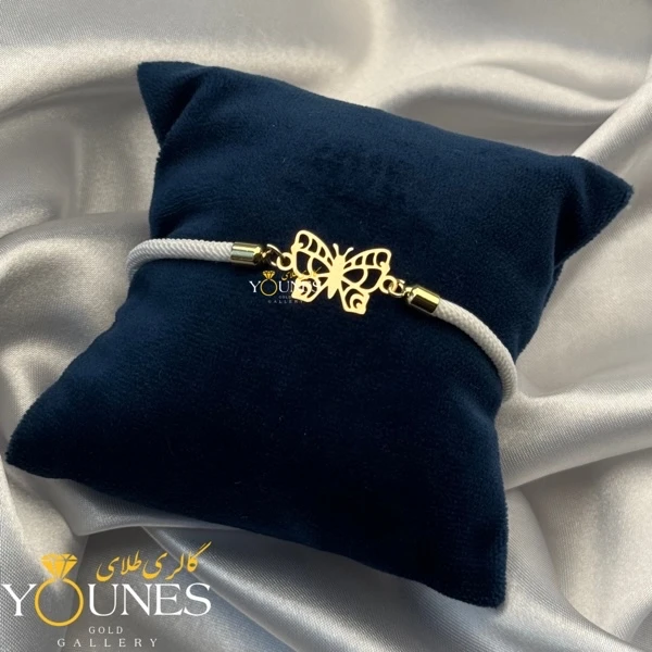 تصویر دوم دستبند پروانه ای مینیمال طلا لیزری